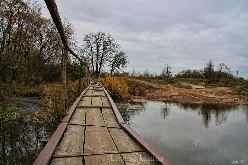 A wooden bridge near the village