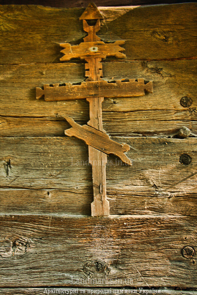 Wood Cross on the wall of the church